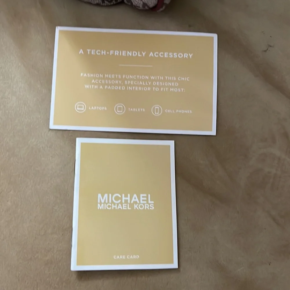 Michael Kors backpack a regular sized. Tan & burgundy with all the zippers. - Picture 6 of 8